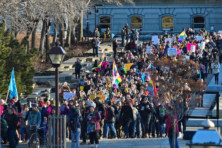 Close to 500 people waving pride and transgender flags joined a march on the United Conservative Party’s headquarters in Edmonton March 27. - Ed Kaiser