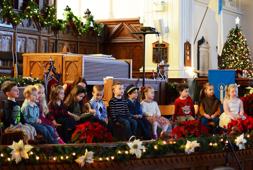 The wait for Christmas is just about over for these Amherst Preschool kids, seen here singing Christmas carols in early December.