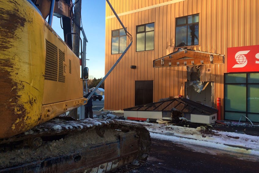 The Scotiabank in Manuels, Conception Bay South was the site of a brazen heavy-equipment break and enter early Friday morning. Thieves used an excavator parked in an adjacent commercial construction lot to remove the drive-thru ATM.