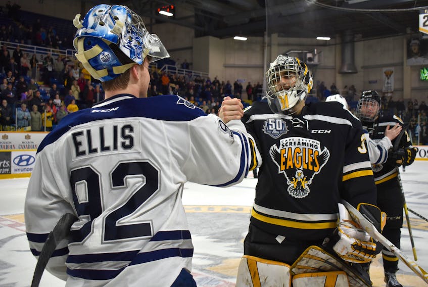 Kevin Mandolese of the Cape Breton Screaming Eagles, right, shakes the hand of River Denys’ Colten Ellis of the Rimouski Océanic following Game 5 of the Quebec Major Junior Hockey League quarter-final series at Centre 200 on Friday. The goaltending battle between Mandolese and Ellis was a headline heading into the series.