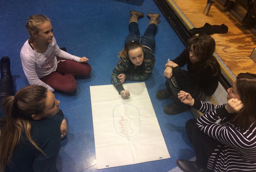 Students from local schools participate in a WE Global Leadership Workshop Wednesday at Northumberland Regional High School. Working on their action plan for World Water Day, from the left, are: Talitha Tolles, WE facilitator; Jaden Joyce, Raven MacKinnon, Eeva Wheeler, all New Glasgow Academy students, and Gabrielle Cheverie, NGA teacher.