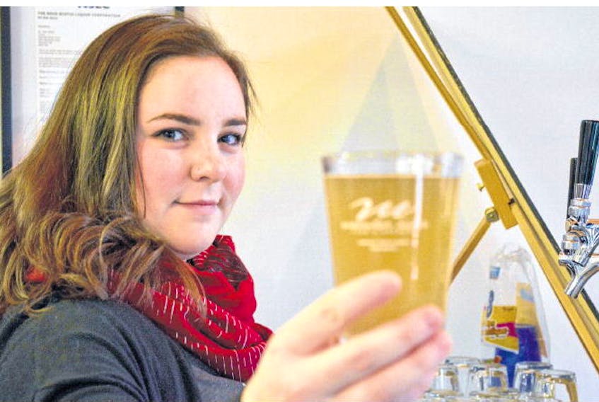 Campbell Bailey pours a glass of the Perry Noel, made with Nova Scotia pears, which is being released on Dec. 1.