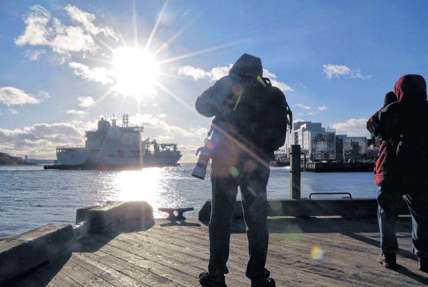 Photographers along the Halifax waterfront take photos as the Royal Canadian Navy’s interim auxiliary oiler replenishment ship, MV Asterix, arrives on its first visit to Halifax Wednesday. The ship’s visit follows its conversion work and commissioning in Lévis, Que.
ERIC WYNNE • THE CHRONICLE HERALD