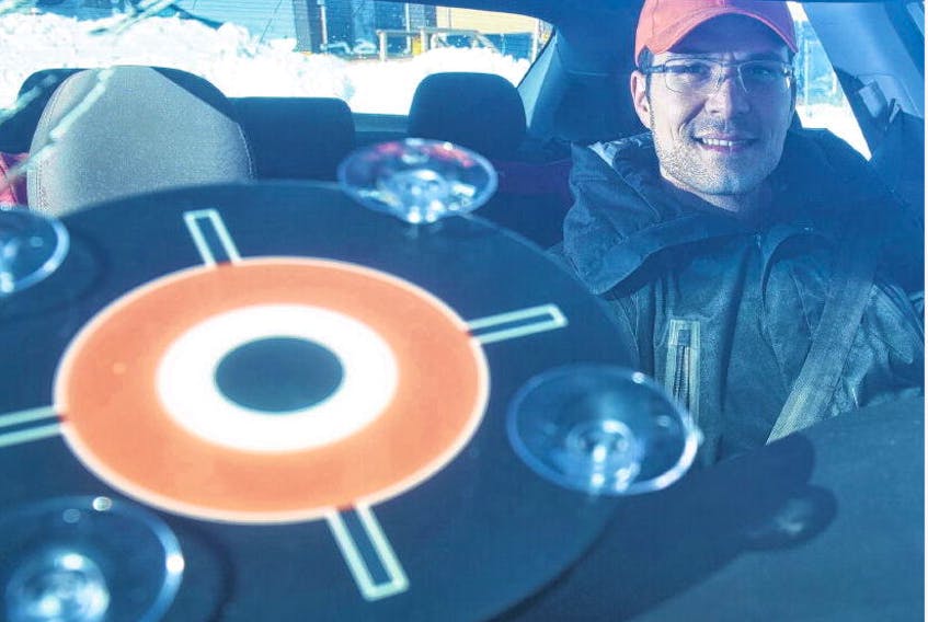 Driverseat franchise owner Marko Jovanic poses for a photo in his car on Wednesday morning. The new chauffeur service will serve Dartmouth and Bedford, starting Thursday. RYAN TAPLIN • THE CHRONICLE HERALD
