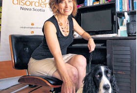 Michelle Hebert Boyd, with her dog Pippa, is executive director of Eating Disorders Nova Scotia. The group will launch its new online peer support service on Wednesday. ERIC WYNNE • FILE
