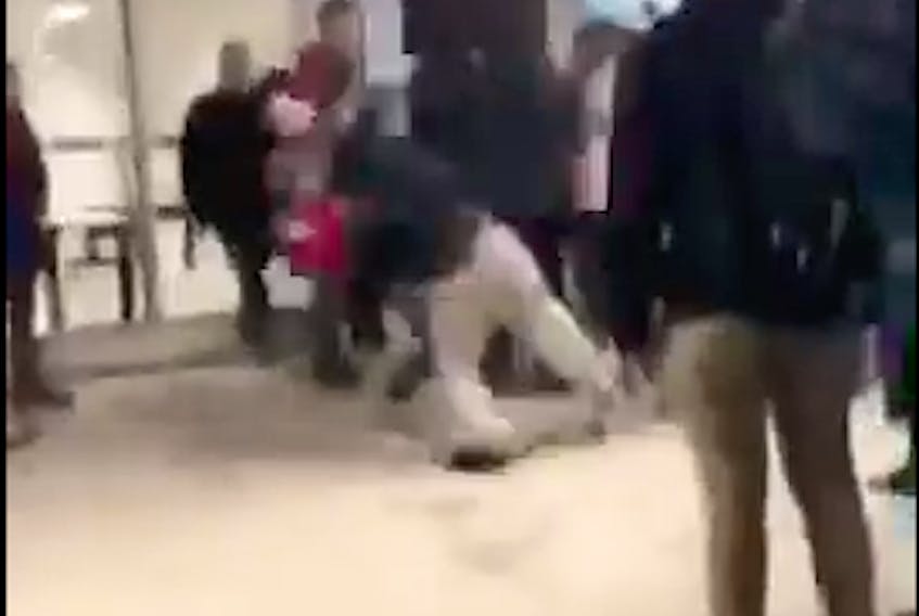 A screenshot of a video depicting a fight at TOSH in Summerside.