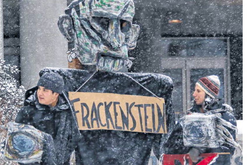 Anti-fracking activists are seen during a rally that was held to defend the ban on fracking in Nova Scotia in Halifax in January. A group of 40 organizations and businesses are calling for the province’s 2014 fracking moratorium to remain in place.
TIM KROCHAK • FILE