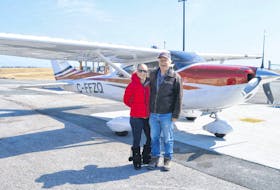 Tamara Corbett, 31, stands beside pilot Bob Rosebrugh, 69, and the Cessna 182 four-seat, single engine plane he owns with pilot Jim Lockyer, 68. Rosebrugh and Lockyer are volunteers with Hope Air and they fly people like Corbett for free to medical treatments outside of their communities.