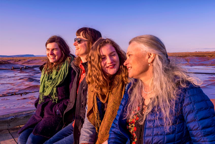 Sarah McInnis, Rebecca Fairless, Ellen Torrie and Kimberly Matheson, the four songwriters, singers and instrumentalists that collaborated to create "Like Coming Home," their new album that will celebrate its release with a concert May 12 at the Al Whittle Theatre in Wolfville. - photo by John Robichaud