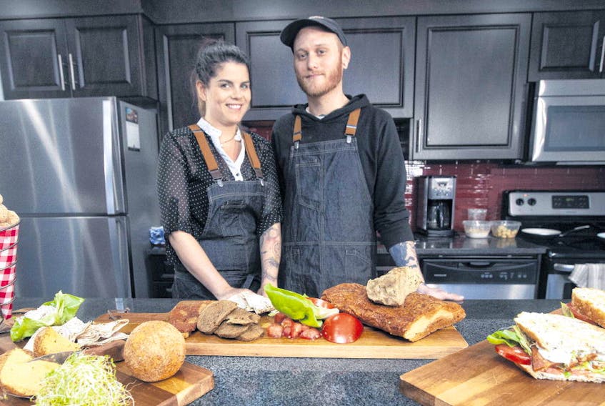 Chef Lauren Marshall and Brandon Levesque with a sampling of food made with the Real Fake Meats.
ERIC WYNNE • THE CHRONICLE HERALD