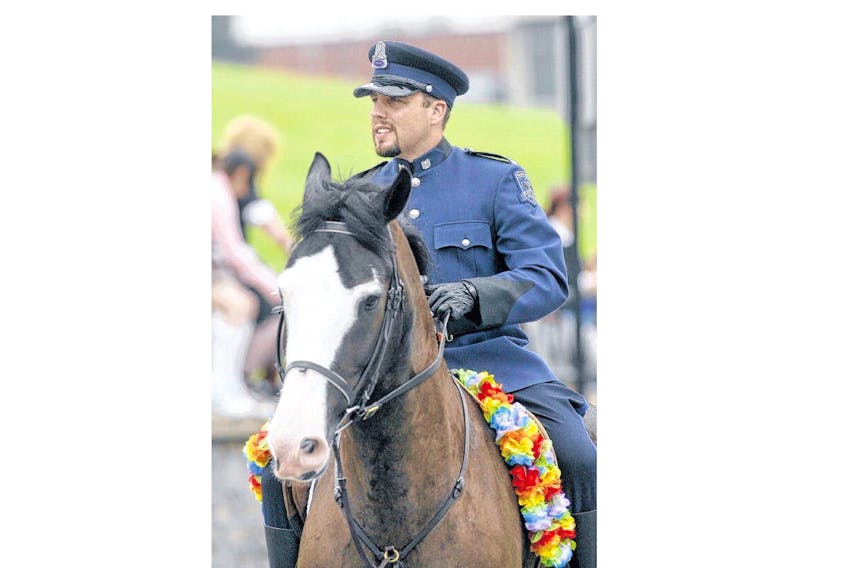 Const. Chris Marinelli with Halifax Regional Police rides Sarge during the 2006 Pride Parade. Sarge has contracted strangles, an equine infection that is like strep-throat, and has been quarantined. INGRID BULMER • FILE