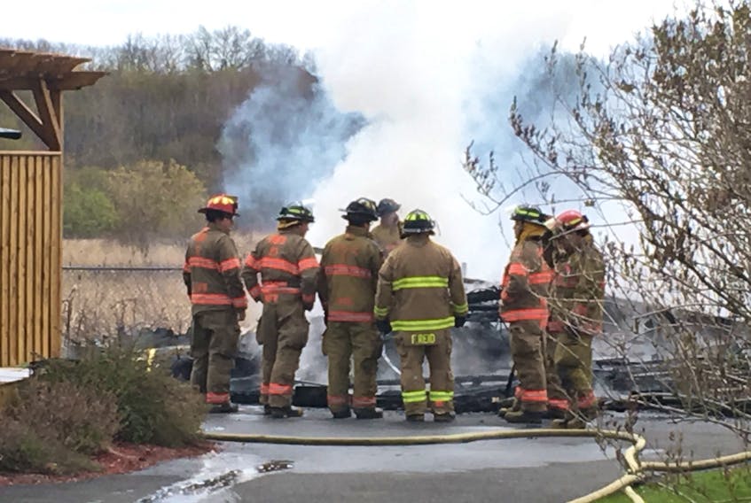 Members of the Glace Bay and Reserve Mines Volunteer Fire Departments are on the scene of a garage fire at 34 Quarry Road, Glace Bay.