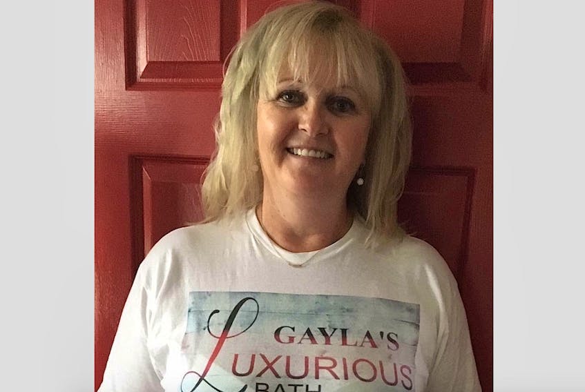 Gayla Saunders in a t-shirt that promotes her business.