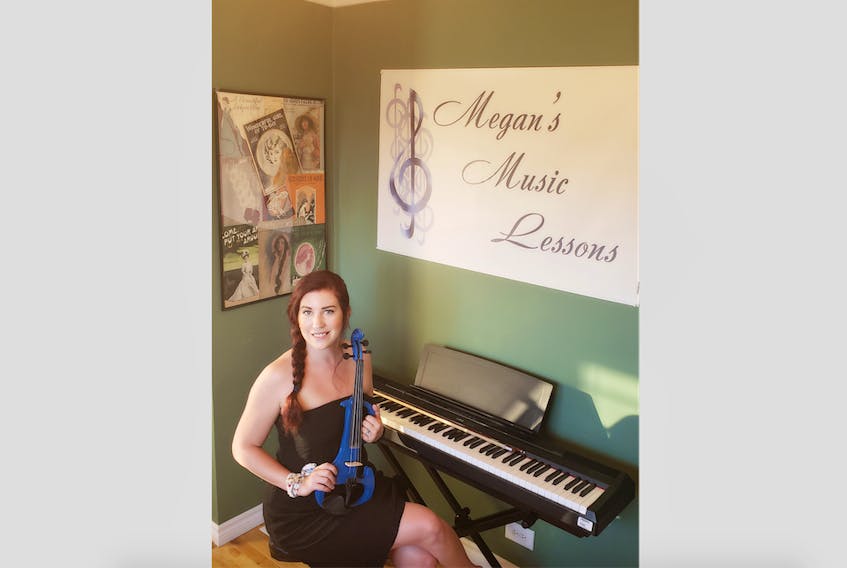 Megan Janes, who moved to Lewisporte with her husband in March, teaches violin and piano at her home studio.