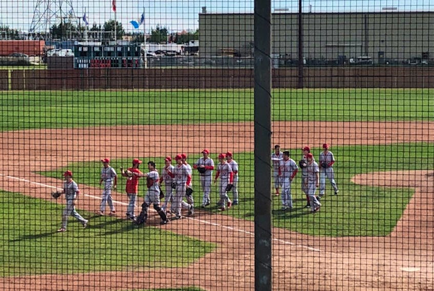 Members of the Cape Breton Ramblers receive congratulations as they walk off the field following a 5-4 win over the team from Fraser Valley, B.C. on Saturday in the semi-final of the Canadian Senior Little League Championship. The Ramblers now face a talented team from Edmonton for the national title in the host city of Edmonton, Alta. Today's game gets underway at 5:30 p.m. Atlantic time.
