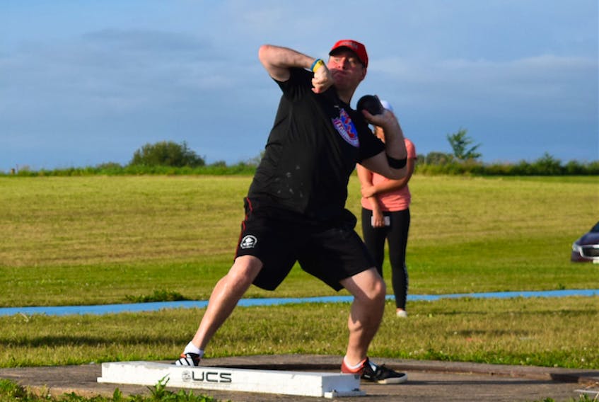 David Bambrick, a Wolfville resident and member of Launchers Athletics for the past eight years, making one of four impressive throws during the shot put portion of the meet.