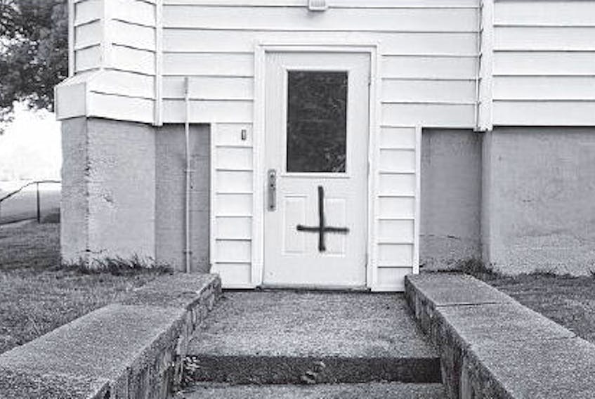 A side entrance to the SonLife Community Church in Dartmouth was defaced with an upside-down cross.
RYAN TAPLIN