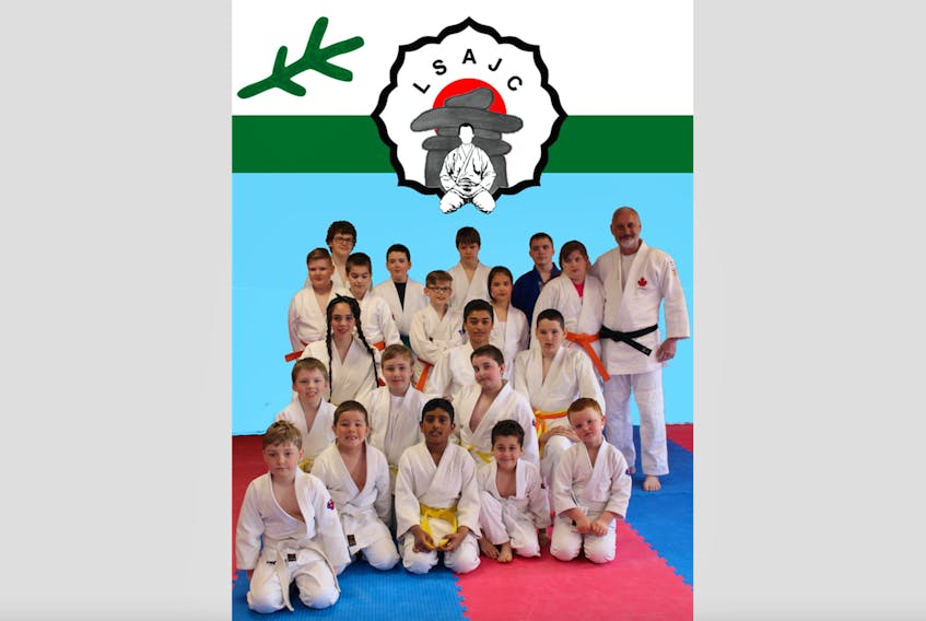 The Labrador Straits Academy Judo Club is open for its fifth season. Members of the club are, front row (left to right): Jonah Rowsell, Jax Ryland, Yashveen Gunput, Omar Ben Attia, Bentley Clarke; second row: Jesse Earle, Jayme Penney, Seth Piercey; third row: Kennedi Holley, Mohamed-Rayen Bouzid, Brendon Linstead; fourth row: James Penney, Julian Flynn, Marcus Flynn, Taylor Buckle, Nicole Flynn, Sensei Didier Naulleau; and back row: Michael Normore, Lucas Buckle, Keegan Fowler and T.J. Flynn.