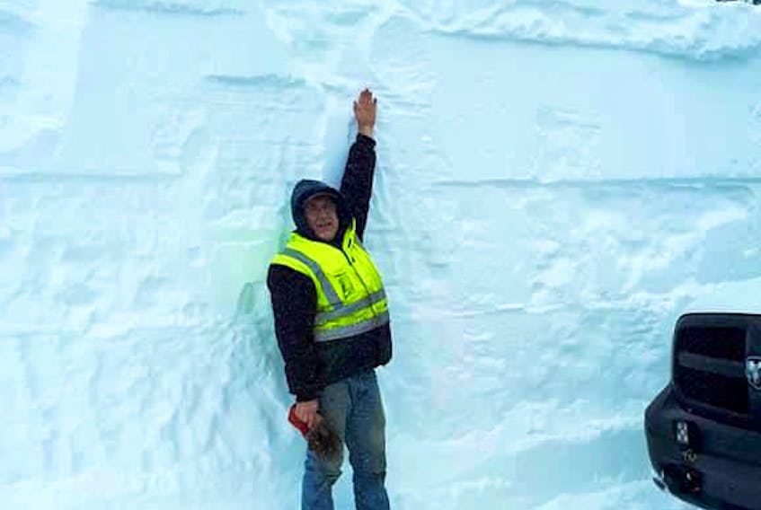 The height of the snowbanks in some areas more than doubles the height of the average Canadian man. B. MacLean