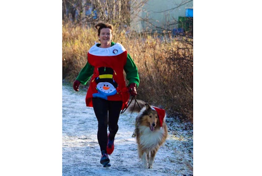 Corina Frank and her collie, Harvard, took part in an ugly Christmas sweater run. Frank began running six years ago and has taken part in several organized events.