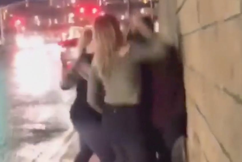 A video shot outside the Avalon Mall over the week shows an alleged assault involving a group of teenagers.