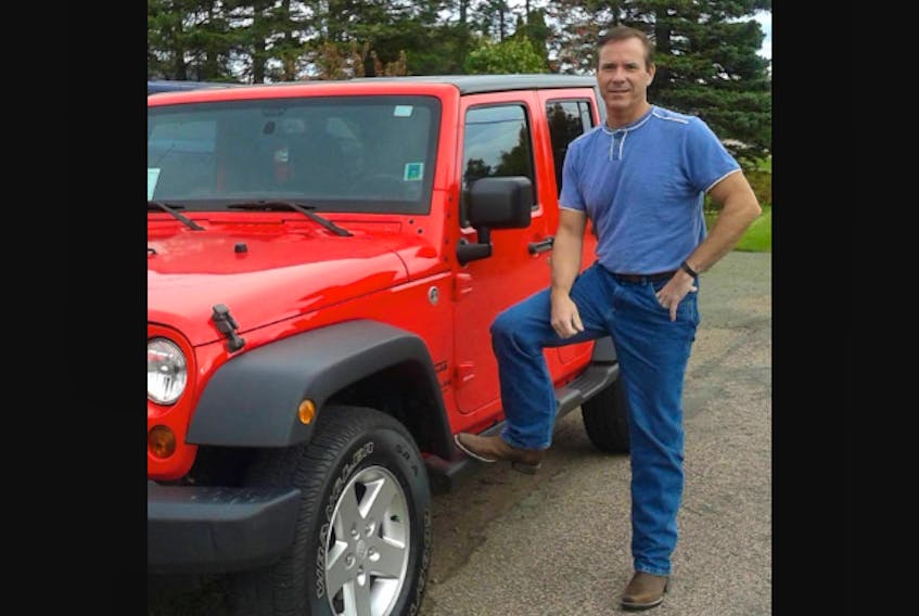 Steve Wohlmuth, who is fondly remembered throughout Kings County following his passing in March, is pictured with his beloved jeep.