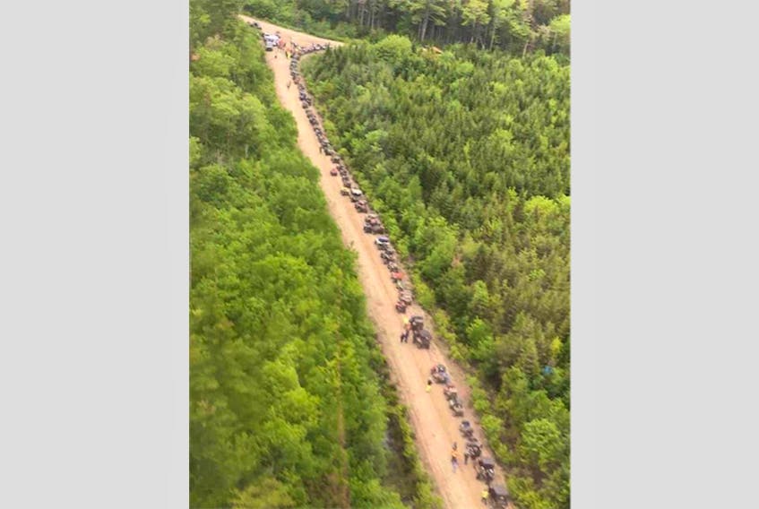 A long line of participants in an ATV appreciation weekend make their way along a trail.
CONTRIBUTED