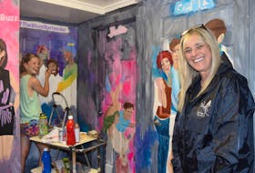 Cecilia McSwain, at left, is seen putting on the finishing touches to colourful murals that cover some of the walls inside Truro’s newest pub, The Blunt Bartender, on Prince Street. Marie McDow, right, is the business owner.