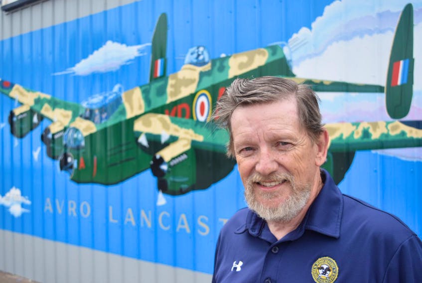It took Pat Power about a month to paint a Lancaster bomber on the wall of the Royal Canadian Air Force Association building in Truro. This is one of several planes he has painted for the organization locally.