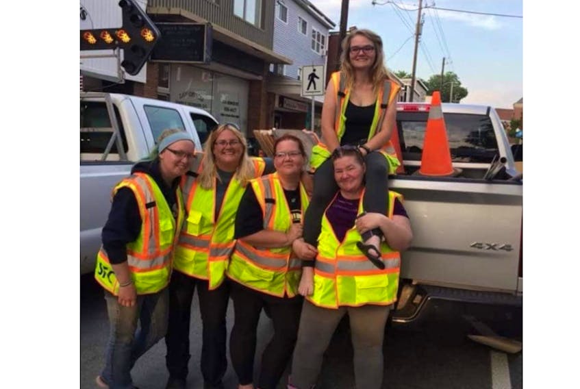 A few of the people who work in traffic control in the Truro area during roadwork got together for a photo. They’re asking people to help keep them safe by driving carefully and not going past when the stop paddle is facing them.