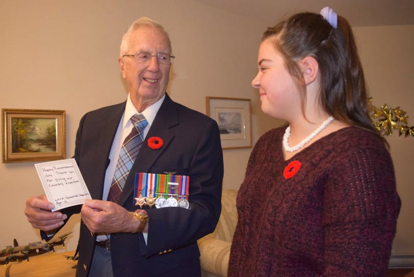 Second World War veteran Roy Morrison enjoys receiving the Remembrance Day thank-you cards each year from Truro teen Savannah Hamilton.