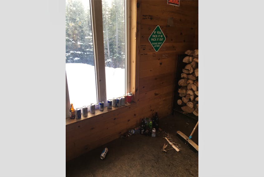 Western Sno-Riders president Mark Hutchinson discovered beer cans and bottles strewn about one of the club's warm-up shacks Feb. 1. CONTRIBUTED