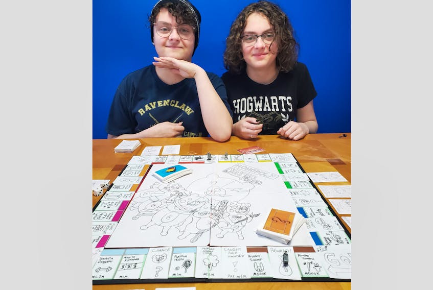 Brown’s Arm sisters Cassie (left) and Cora Boyd used their time away from school because of the COVID-19 virus to create a board game based on their favourite video game. Contributed photo  - Saltwire