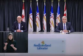 Newfoundland and Labrador Health Minister John Haggie (left) and Premier Dwight Ball during the Monday, March 30 COVID-19 Update.