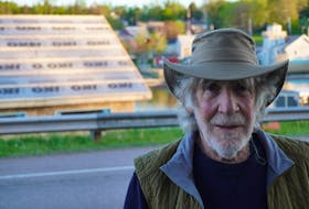 Robert Lethbridge stands at the end of his driveway in Cardigan on June 4. Behind him is an under-construction kayak building.