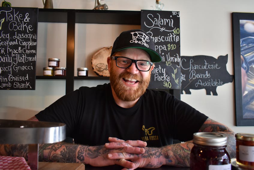 Dave Mottershall stands behind the counter of the newly re-opened Terra Rossa in Charlottetown. The grocerant offers a selection of local produce and products as well as dine-in or take-away service.