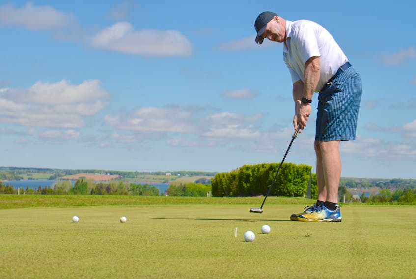 Tim Yorke practises his putting before a round earlier this season at the Countryview Golf Club in Fairview.