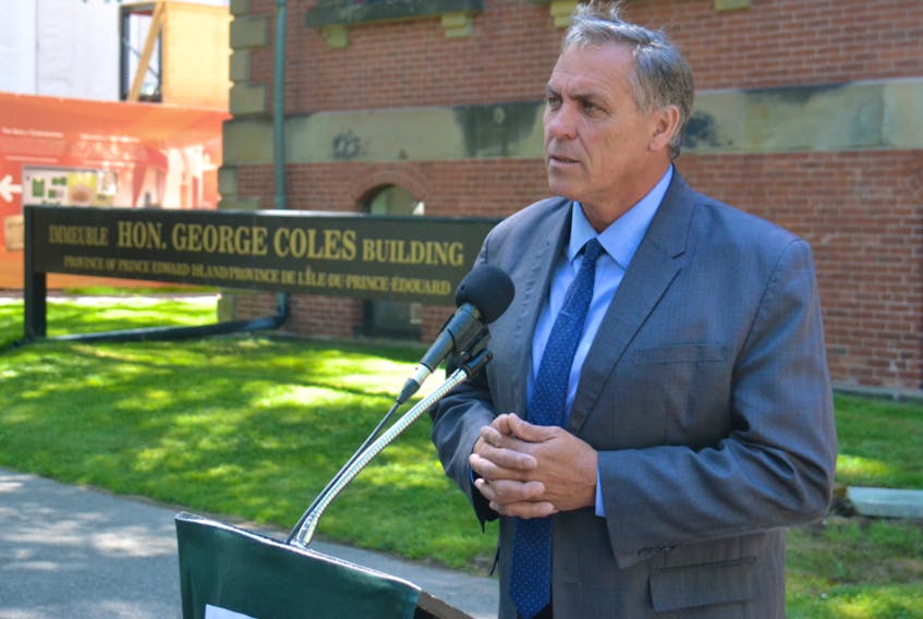 Liberal MLA Robert Mitchell, speaking to media outside the Coles Building on Tuesday, said he believes the recent staff layoffs and program cuts are a sign that funding to Holland College needs to be increased.