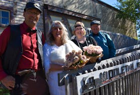 Groom Cass Moon and bride Tina Arsenault join witnesses Patti Scribner and Willard C. Henderson for a photo after tying the knot at the Middleton Railway Museum on Aug. 19. The group was dressed in 1920s attire, with the groom portraying a guy from the wrong side of the tracks.