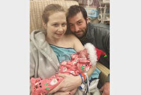 Natasha Constable and Nathan Gallant hold their new baby, Ariel Victoria Gallant, at the Queen Elizabeth Hospital on Christmas morning.