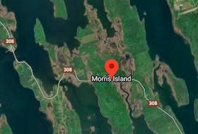 A search was underway Jan. 12 near Morris Island after a boat capsized leaving one person dead and another missing.