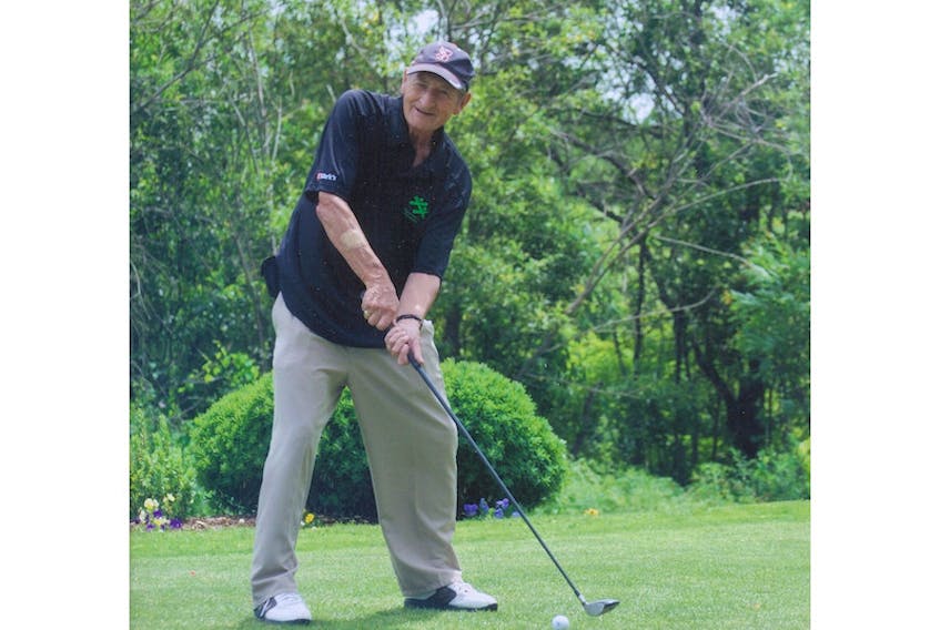Walter Gretzky tees off during a Summerside Boys and Girls Club celebrity golf tournament. He died last week at the age of 82.