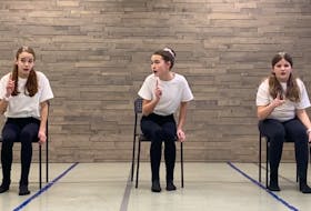 In a video submission, Molly Thompson (left), Olivia Gouthro and Lily Arthurs perform Santa's Little Teapot (Dan Goggin) for the Musical Theatre Trio - 12 and Under category. The festival has gone virtual this year because of COVID.