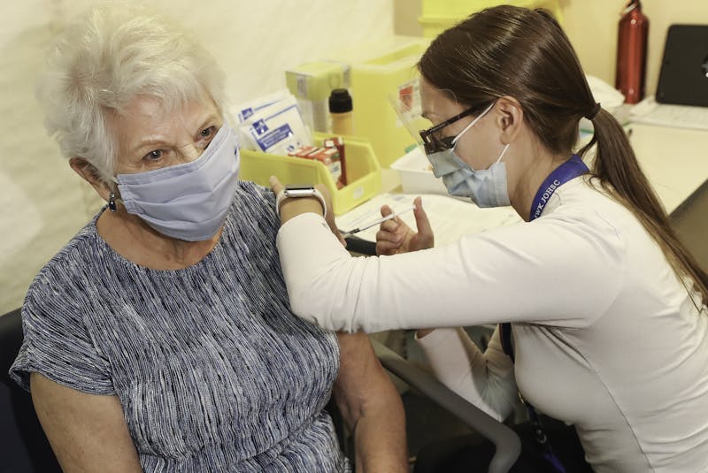 Bernice Brown, 82, of Halifax, receives her vaccine from Allison Milley, RN at the IWK Health Centre. About 27 per cent of Nova Scotia's population have been vaccinated as of April 28. - Communications Nova Scotia/File
