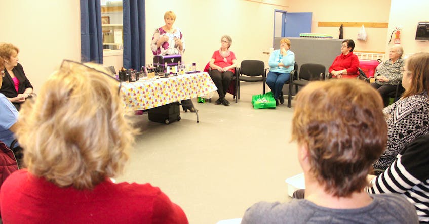 Tracey LaTulippe talks to a group of 20 ladies about healthy skin care and mineral-based products during the Seniors Spa Day at the Glace Bay Library on Jan. 14. The event is one of 15 that have been planned for different libraries around the Cape Breton Regional Municipality for seniors, which started in December. Funded by the federal government's New Horizons for Seniors program, each week has a different theme such as DIY spa treatments, emergency preparedness and artwork. NIKKI SULLIVAN/CAPE BRETON POST 
