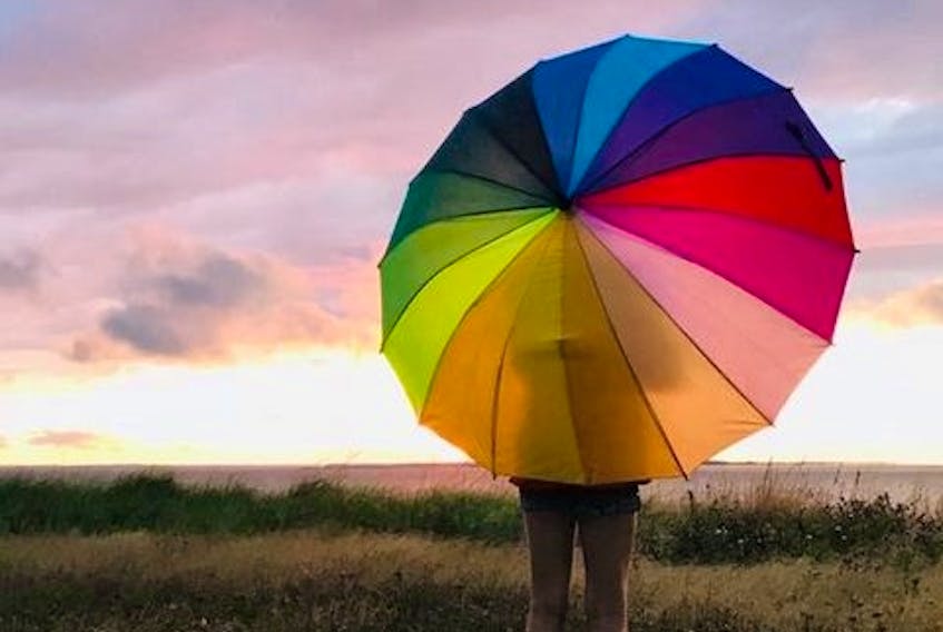 I love the weather and I collect umbrellas, so this picture certainly got my attention.  Leanne MacArthur Matthews took this remarkable photo and titled it “a rainy sunset in Darnley, P.E.I.” Leanne also made a very good observation: “if you look closely, you’ll see that each colour in the umbrella can be found somewhere in the photo.