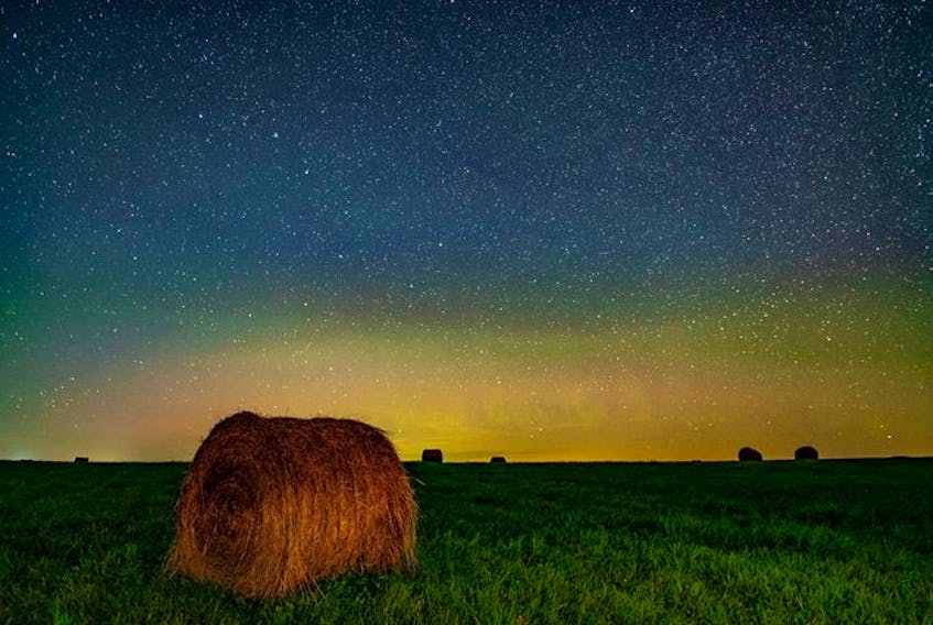 There’s more to this stunning fall photo than meets the eye. The obvious bale of hay stands out in the farmer’s field, but if you look closely, you’ll notice the soft hues of the Aurora and the Big Dipper, too! I want to thank Barry Burgess for sharing his amazing photos with us. He snapped this one earlier this month in Brooklyn, N.S.
