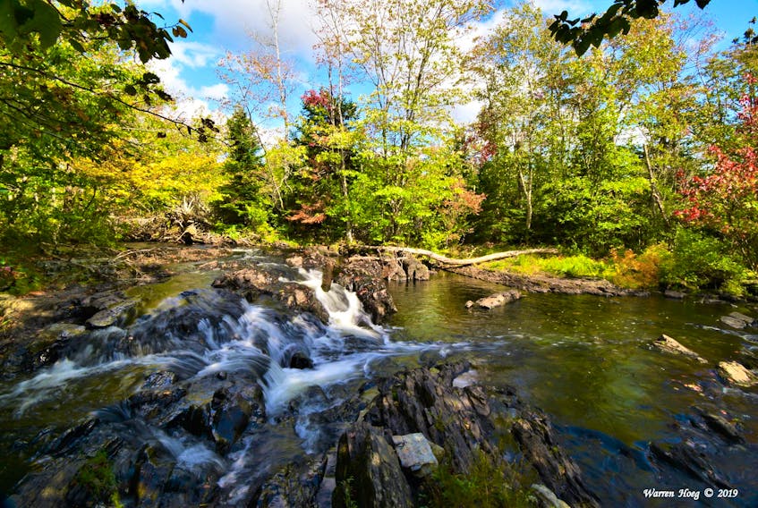 With October just around the corner, we’re starting to see glimpses of some fabulous fall colours.  Warren Hoeg made his way to Morris Brook Falls near Cow Bay, N.S earlier this week and captured this stunning scene. Warren takes amazing photos and this one is no exception.  The depth of field and exposure make this picture calendar-worthy.  Thank you for thinking of us Warren.