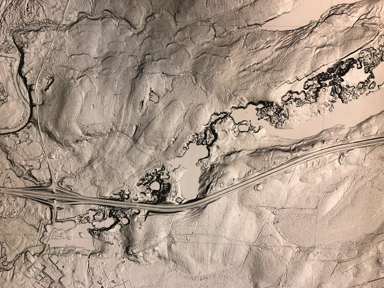 A photo of a preliminary LIDAR map of the region around Oxford, obtained by Cumberland-Colchester MP Bill Casey, shows the presence of what could be multiple sinkholes near the Trans-Canada Highway. The sinkhole in the Lions Park is near the lower left corner. The number of sinkholes in the area and a perceived threat to the highway has prompted Casey to write to both the provincial and federal transportation ministers asking for additional study.