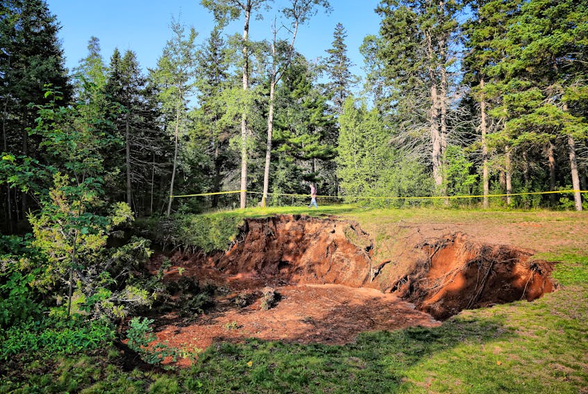 A sinkhole in the Oxford Lions Park is continuing to grow and people are being reminded to stay away from the barricaded area as it's still a developing situation. - Shaun Whalen Photography photo